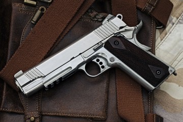 gun and leather bag